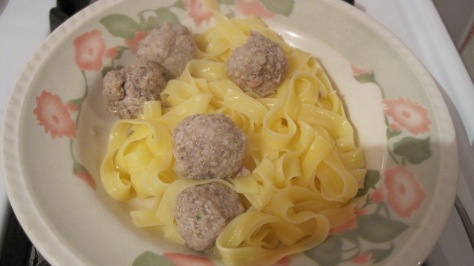 Meatballs dropped in boiling water with the pasta, then simply add butter and salt to your preference.